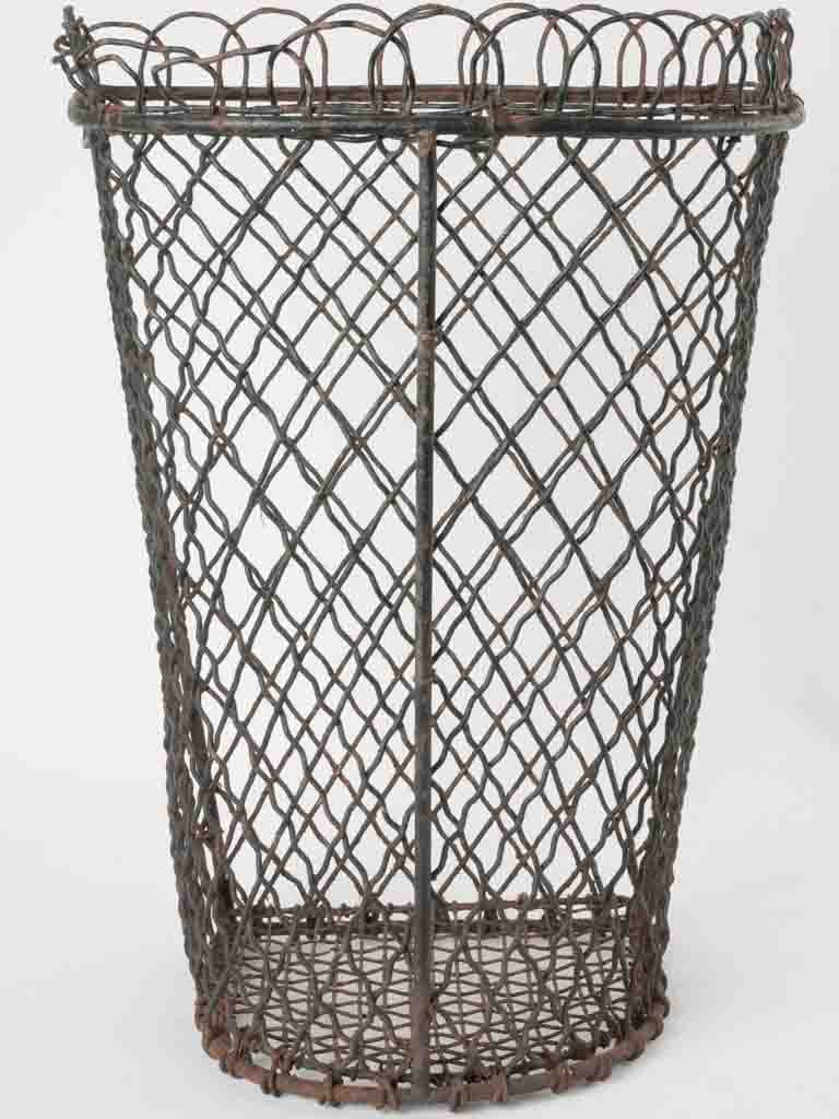 Antique wall-mounted planter wrought iron