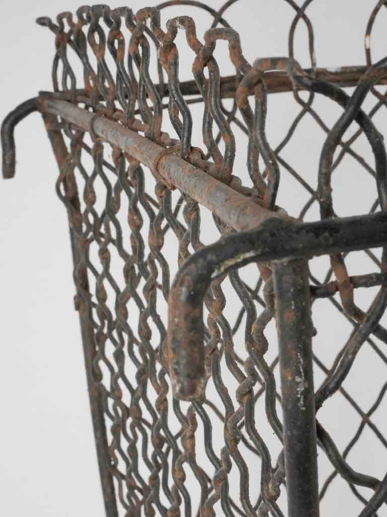 Historical French park fence garbage can