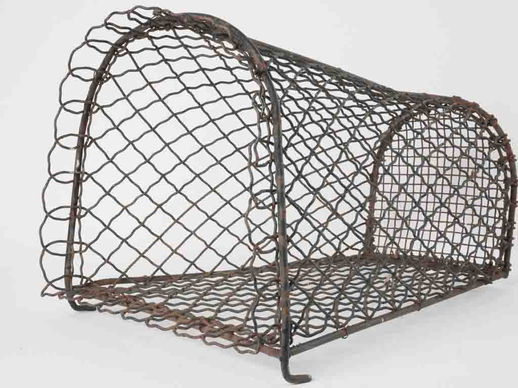 Aged ornamental metal waste paper basket