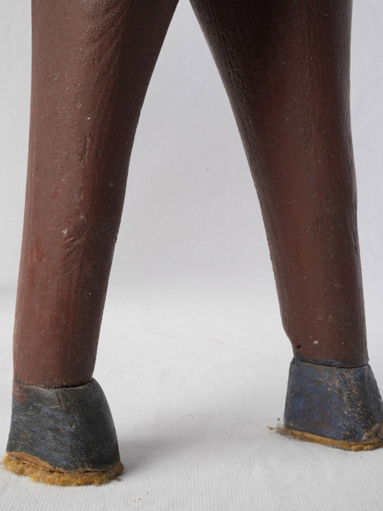 Handcrafted black-hoofed toy horse