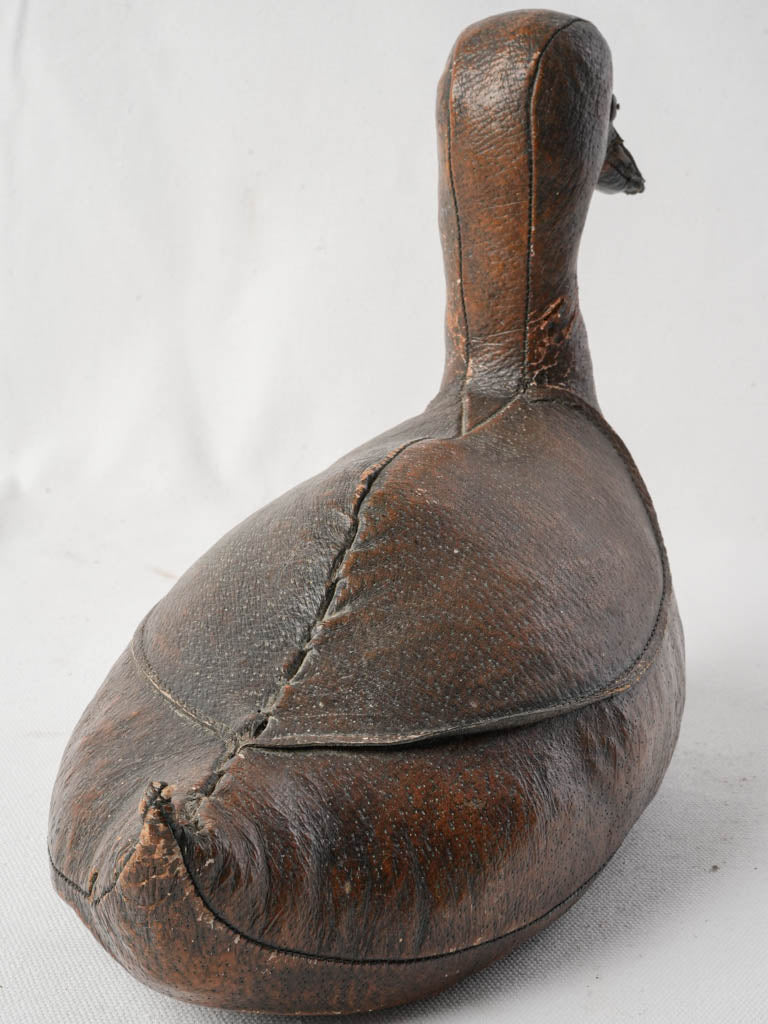 Sculptural stitched leather ornament