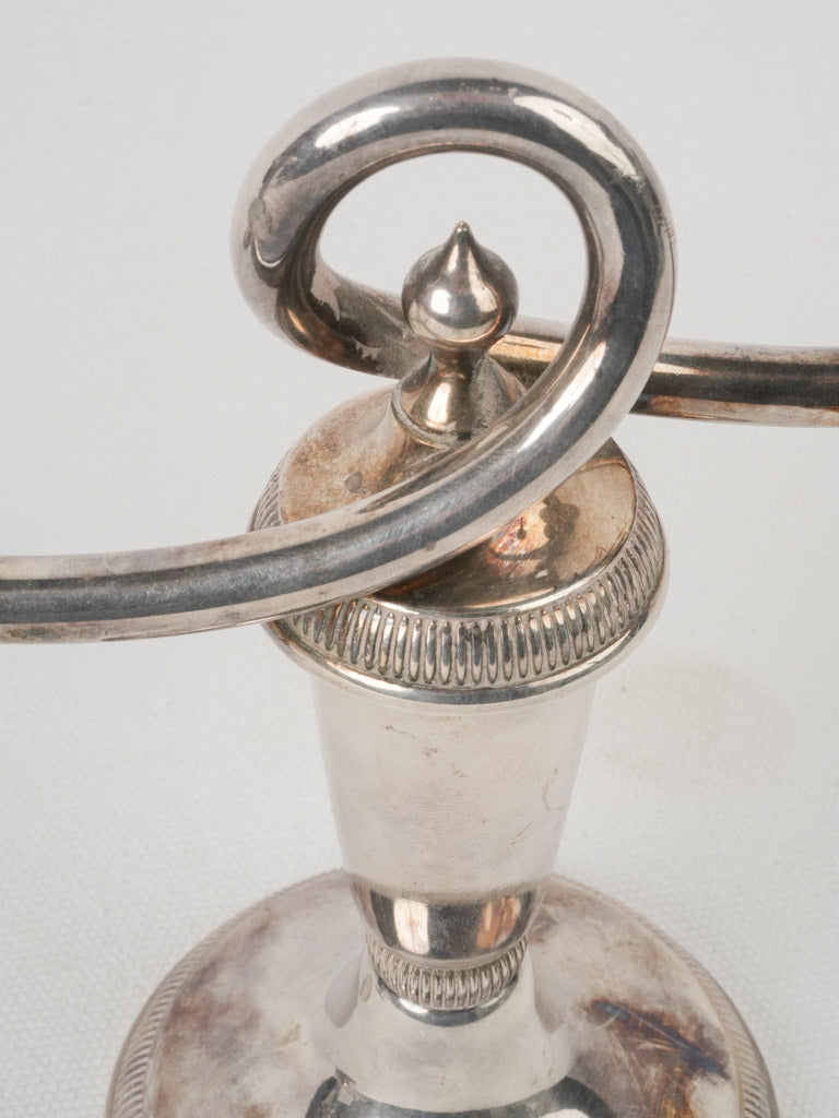 Historical ornate looped candelabras