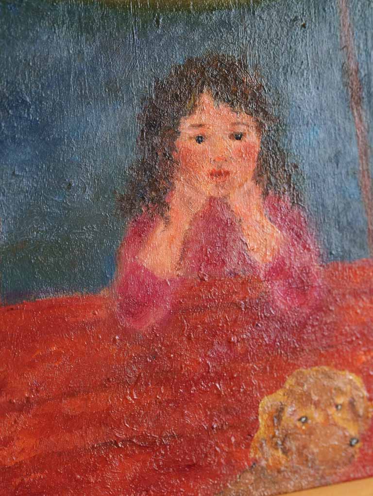 Introspective gentle child-dog scene.