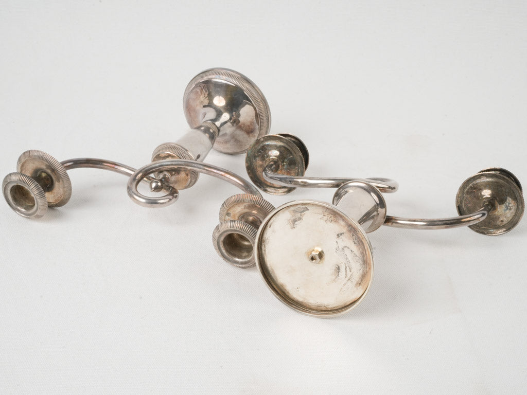 Collectible scroll-detail candle arms