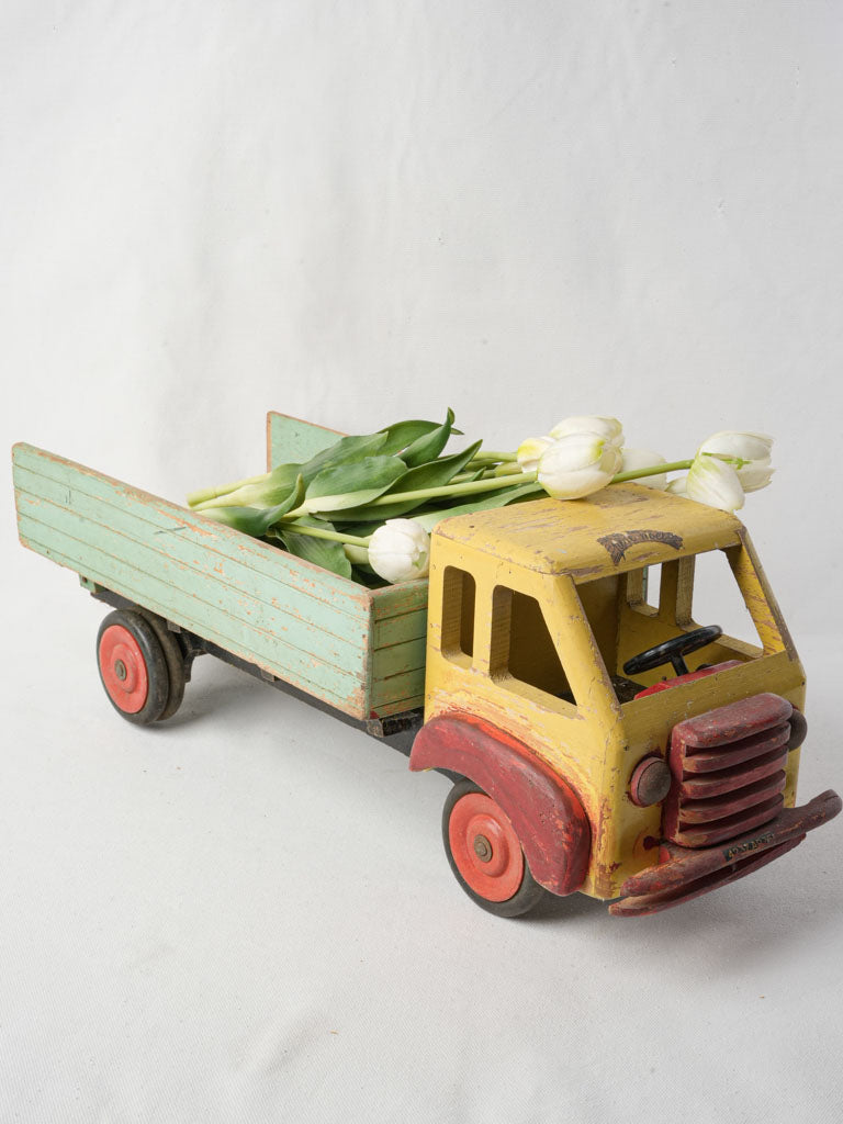 Vibrant vintage wooden toy truck