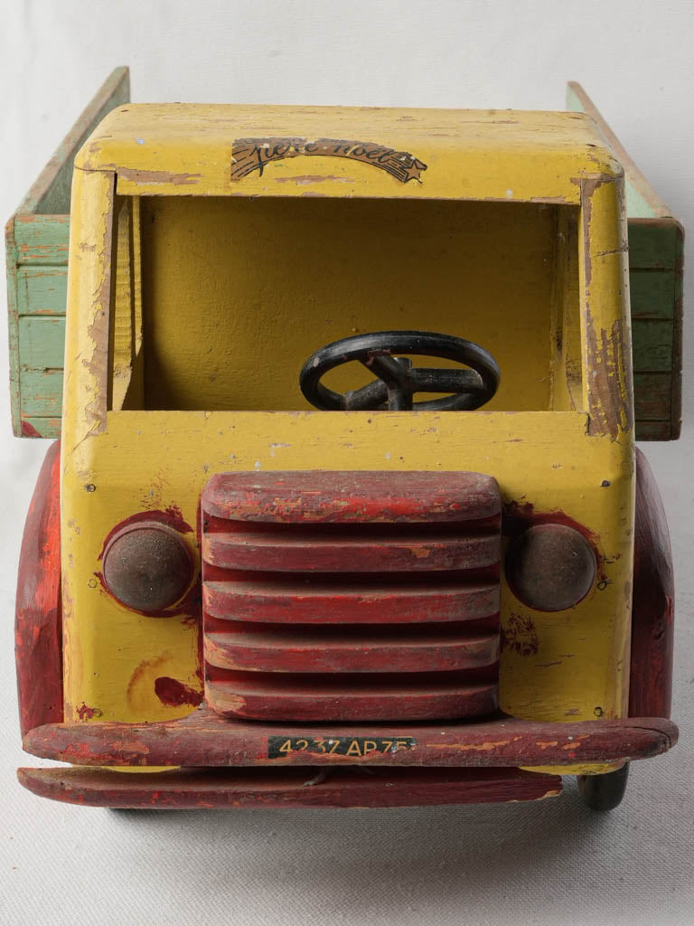 Whimsical carved wooden truck  