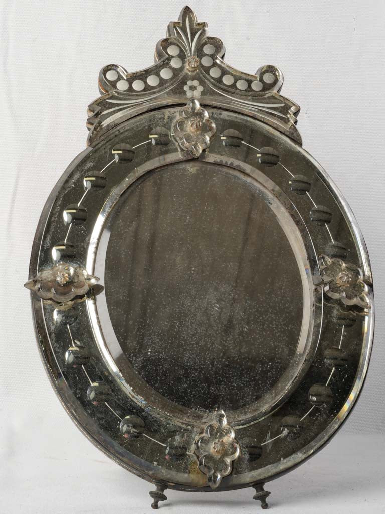 Elegant crest Venetian mirror