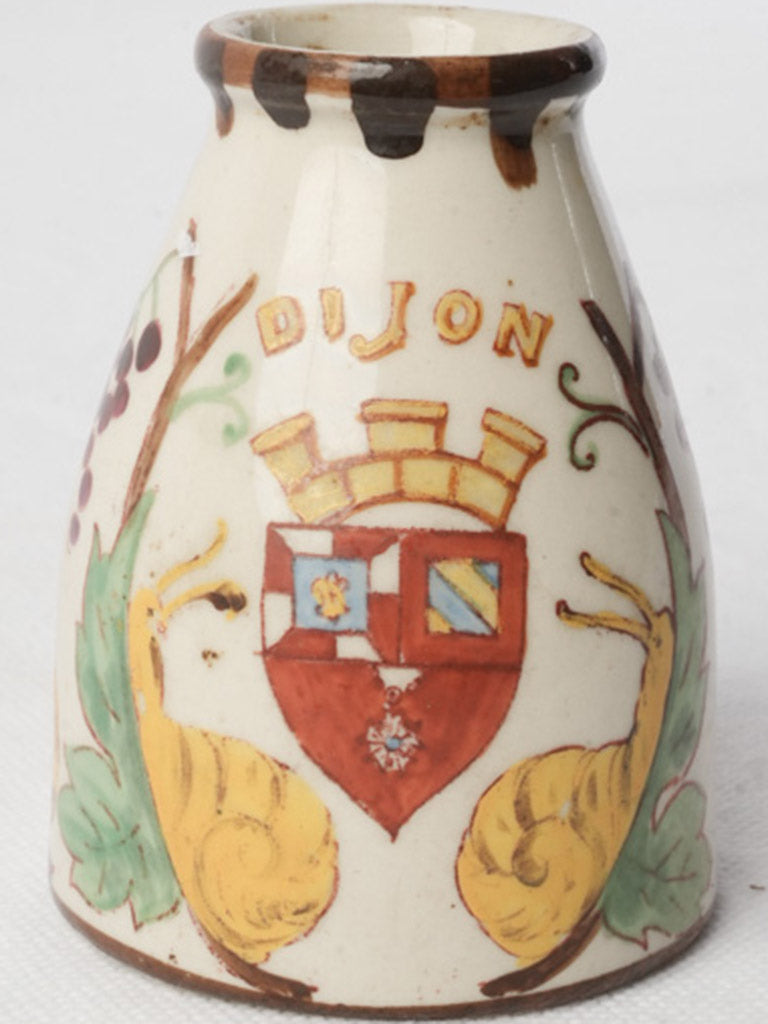 Stylized snail and grape vessel