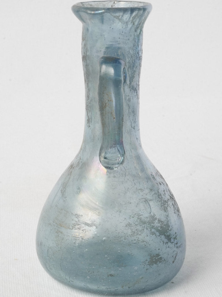 Handmade iridescent scavo glass vessel