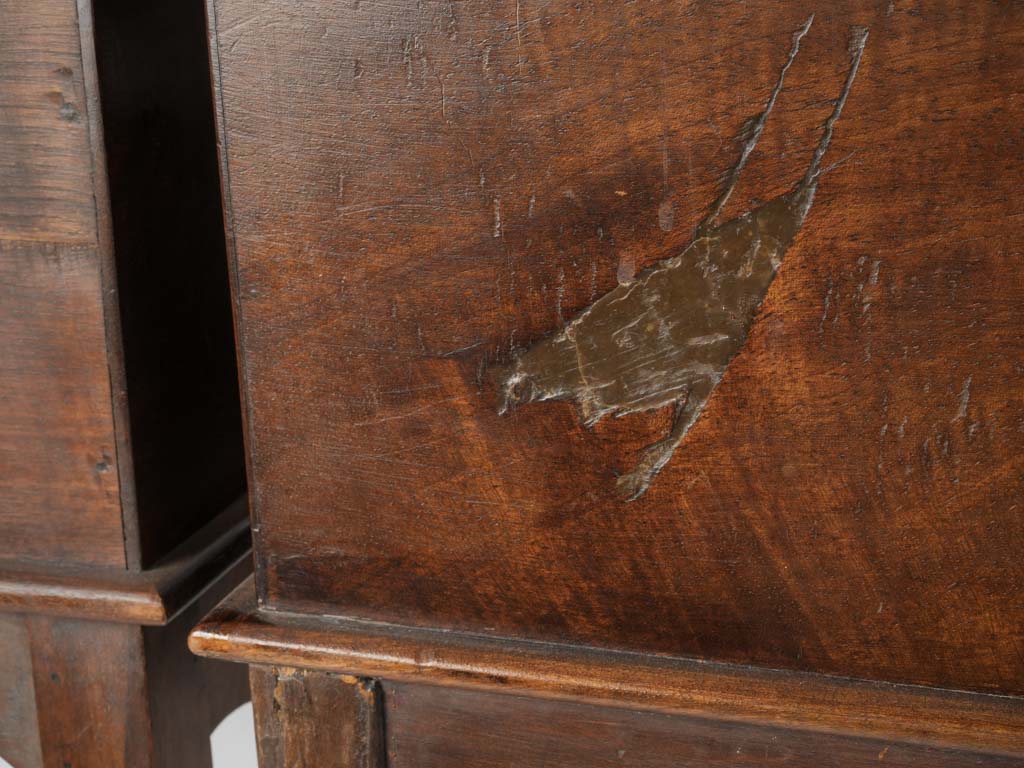 Elegant French walnut nightstands with clover detailing
