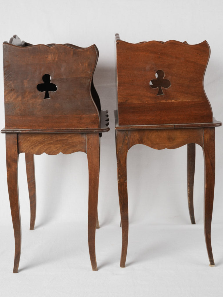 French Rococo walnut nightstands with clover cutouts