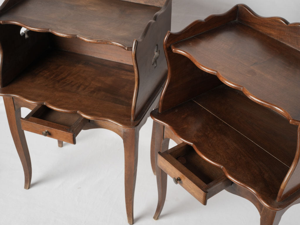 French Rococo walnut nightstands with clover cutouts