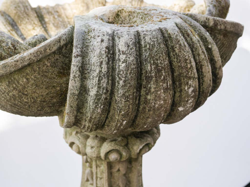 Understated French stone birdbath