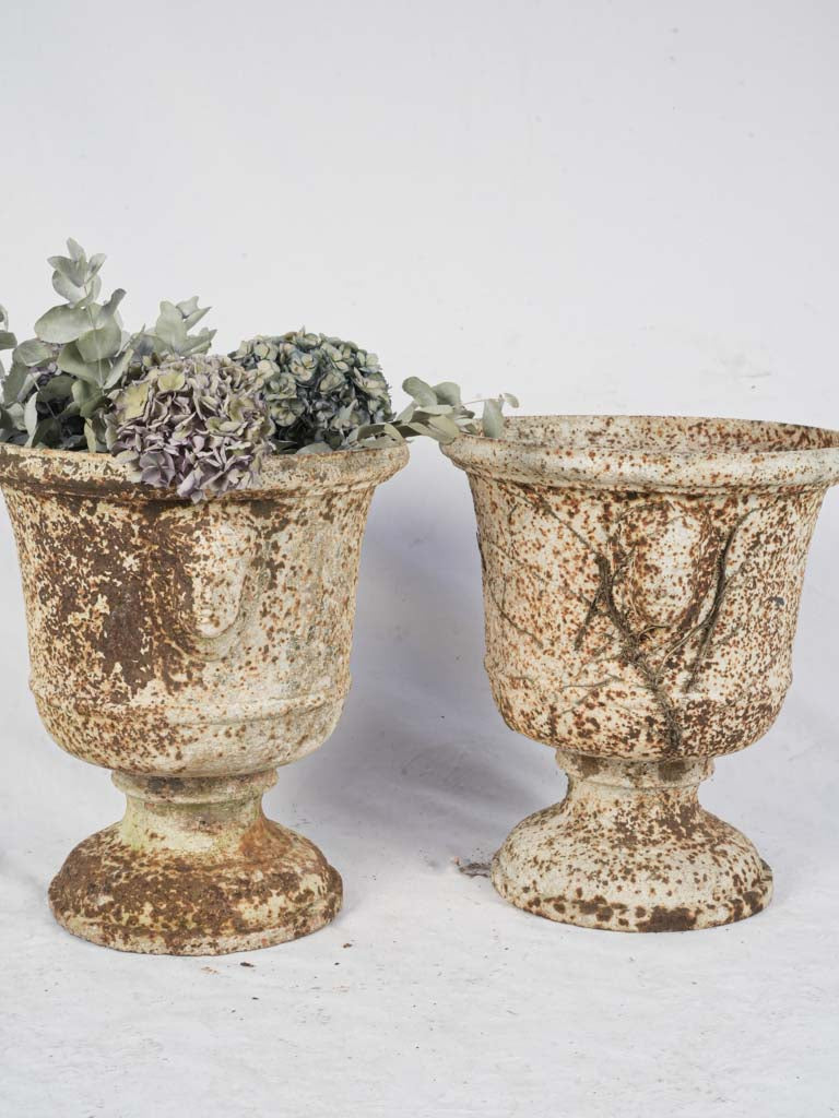 Rare sculptural decorative iron urns