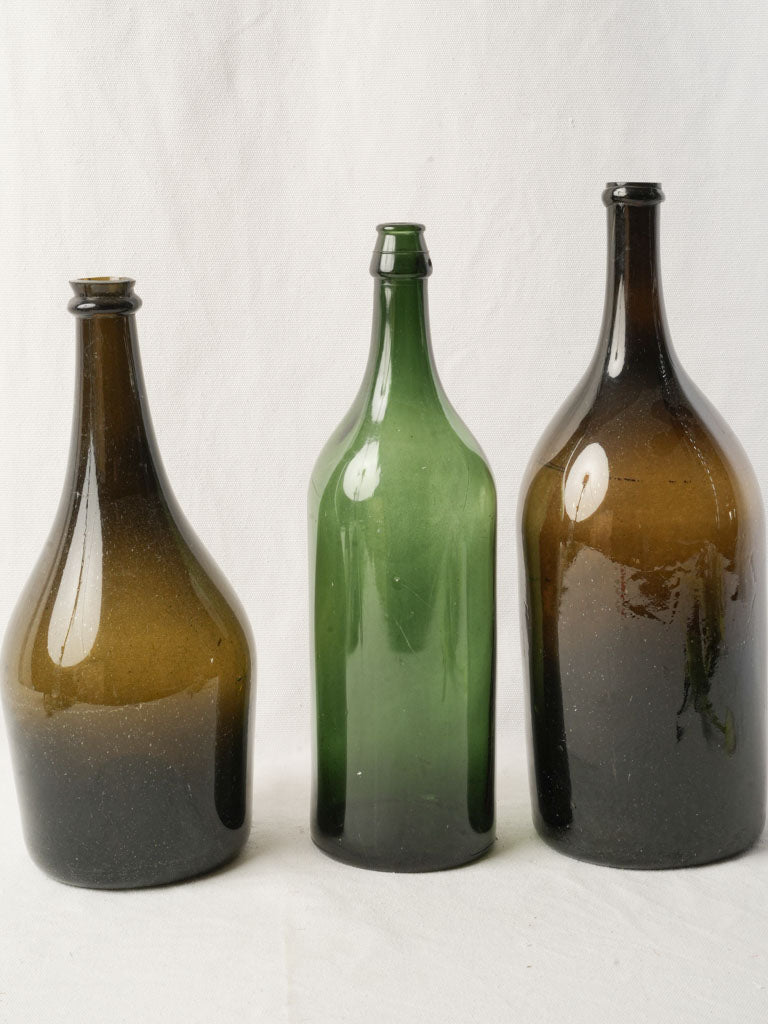 Set of 3 Antique French Hand Blown Wine Bottles in Green and Amber Glass - 15¾"