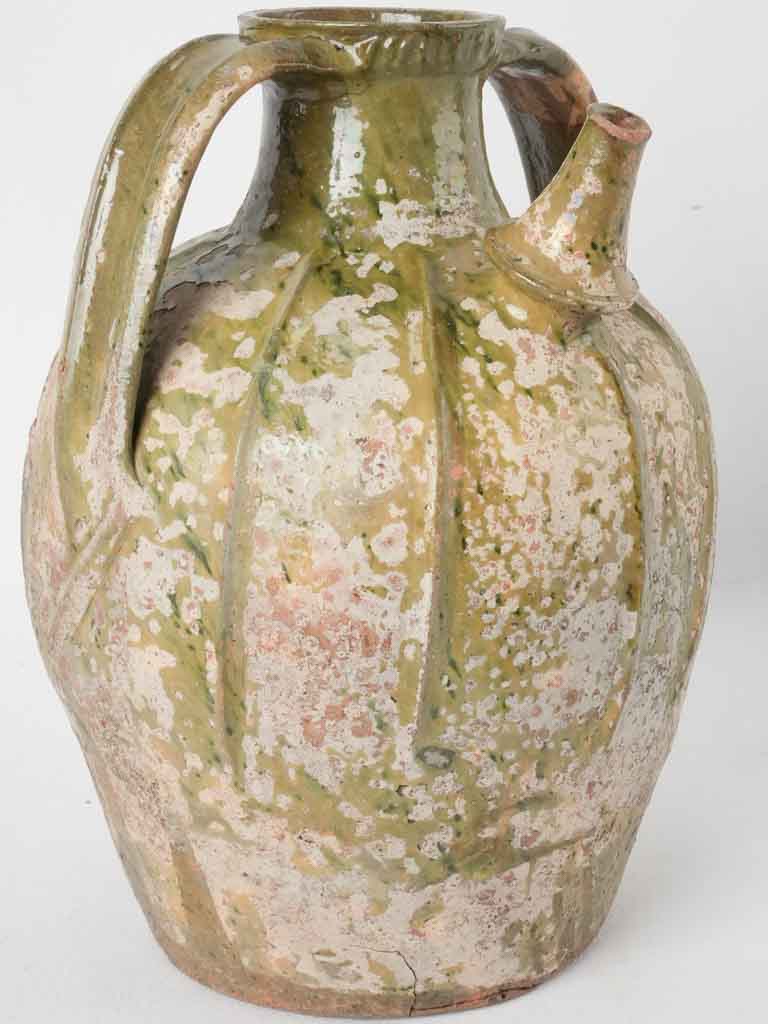 Antique French walnut oil jar