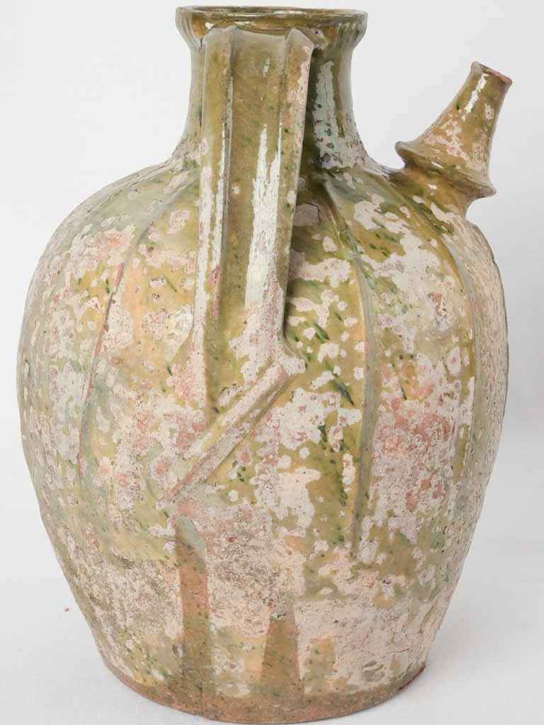 Nineteenth-century timeworn oil container