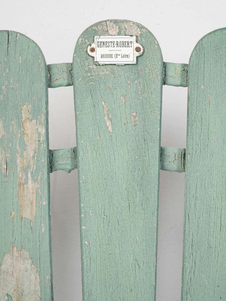 Sculptural antiqued metal patio seat