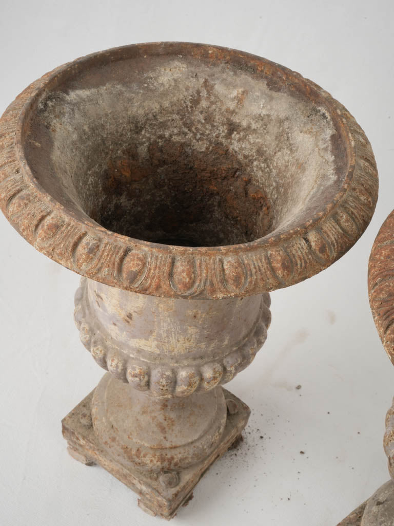 19th-century cast iron urns