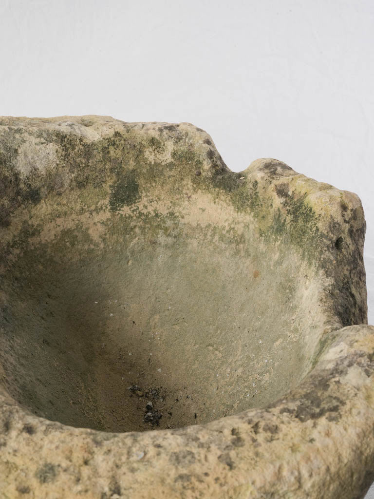 Timeless medieval carved limestone basin