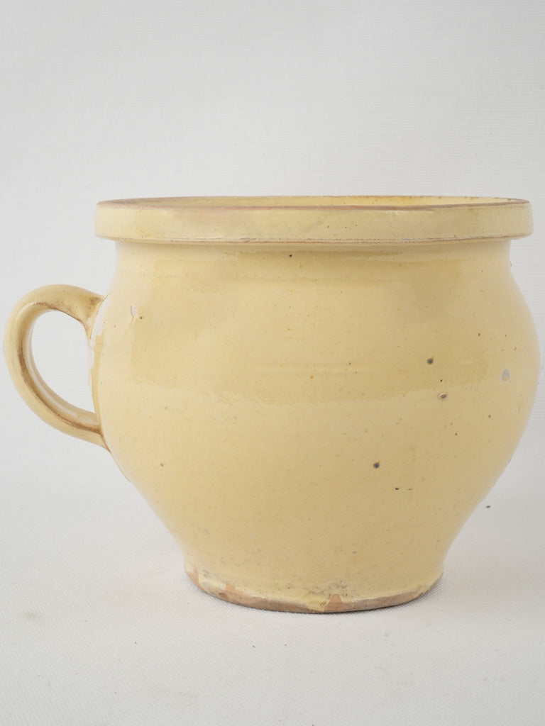 Vintage French pale yellow glazed chamber pot