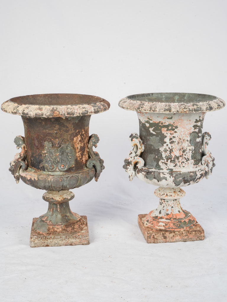 Weathered antique Medici-style urns
