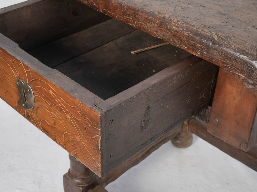 Historic marquetry-adorned oak table