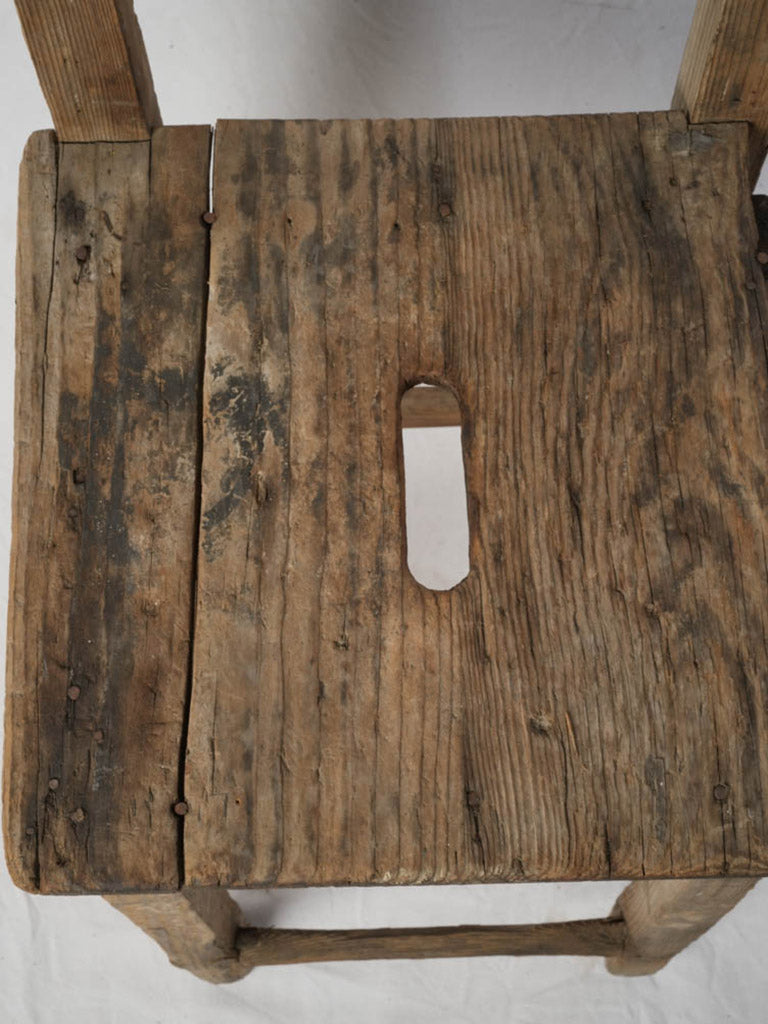 Traditional rustic stool with backrest
