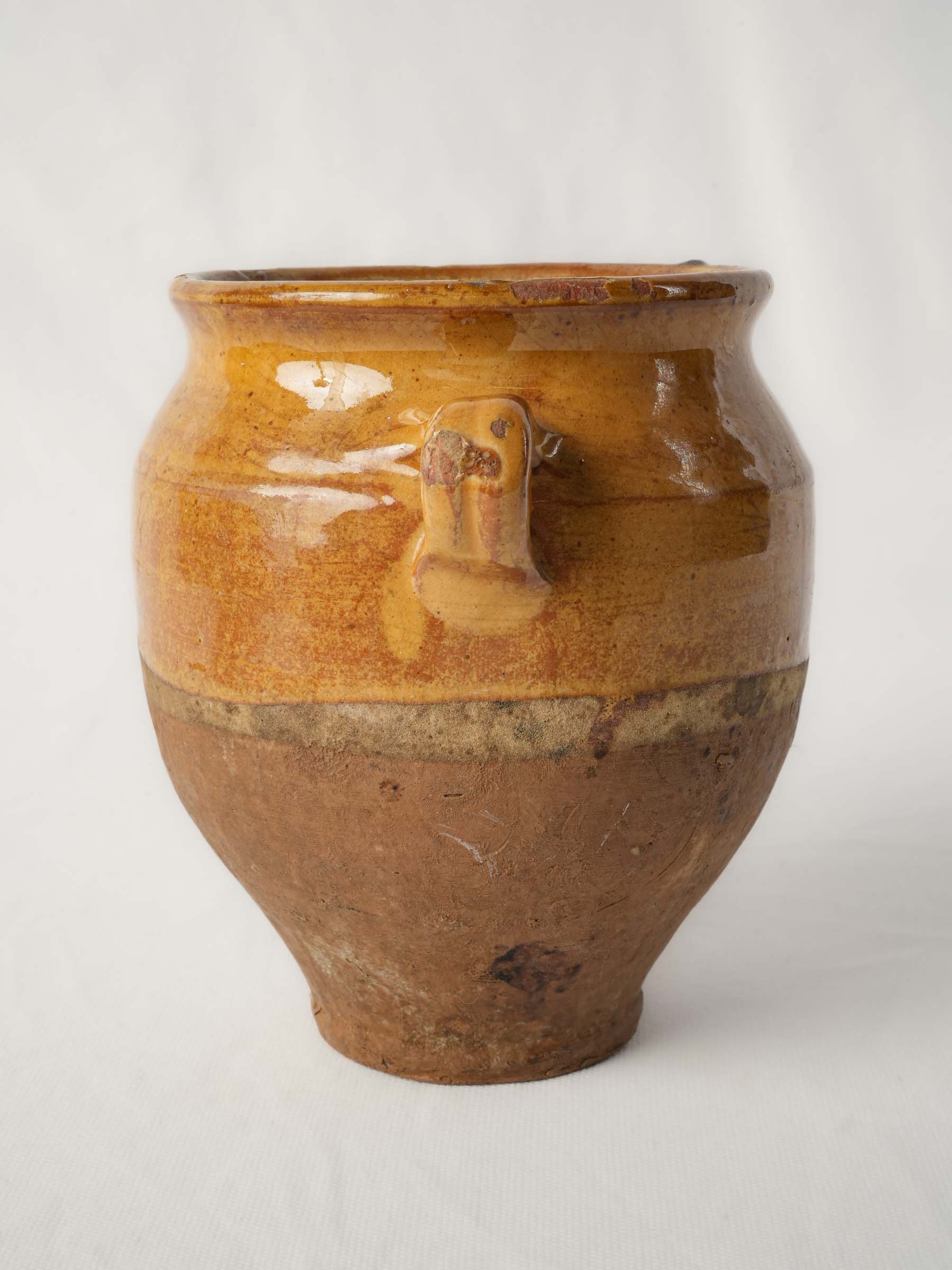 Textured early 20th-century clay jar
