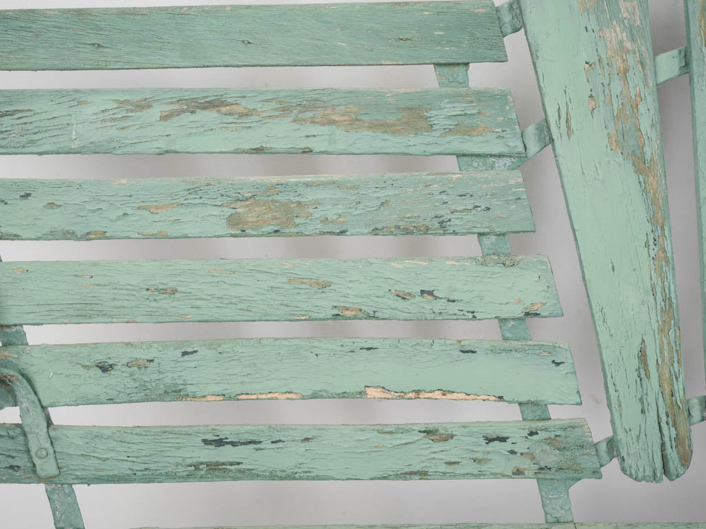 Finely arched iron bench