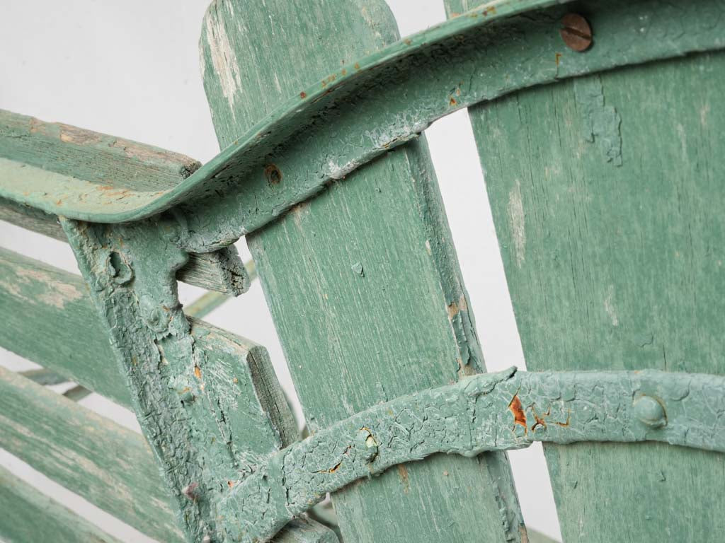 Scrolling iron arms bench