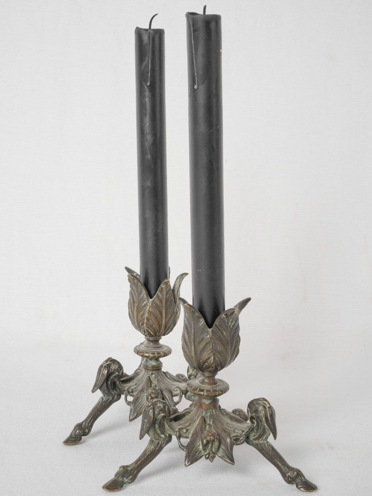 Vintage hoofed candlestick pair
