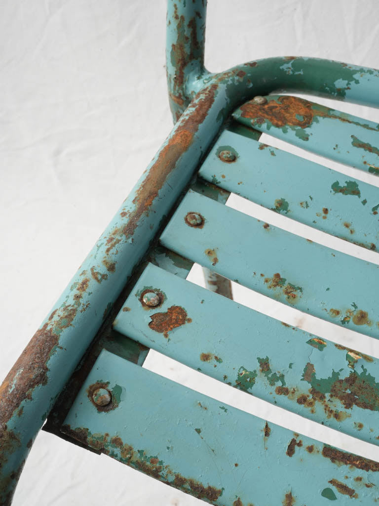 Artistic oxidized metal bistro chairs