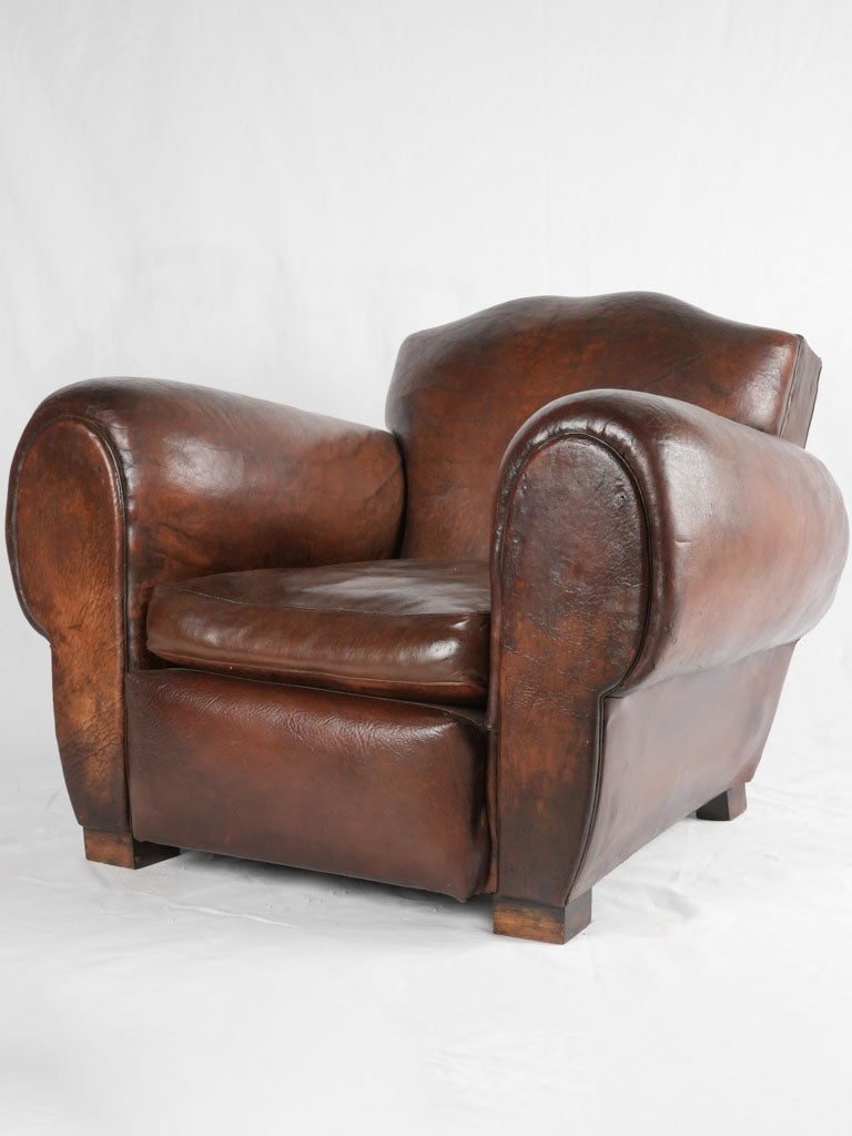 Large 1930s Havana moustache back leather club chair