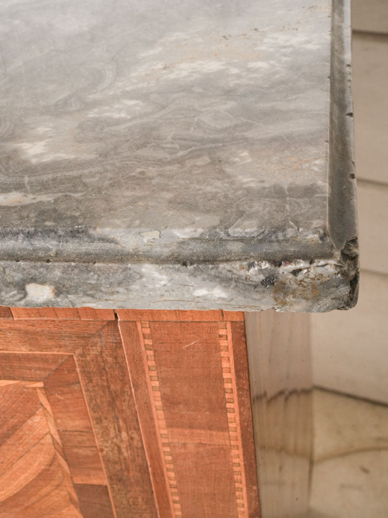 Textured marbled commode desk
