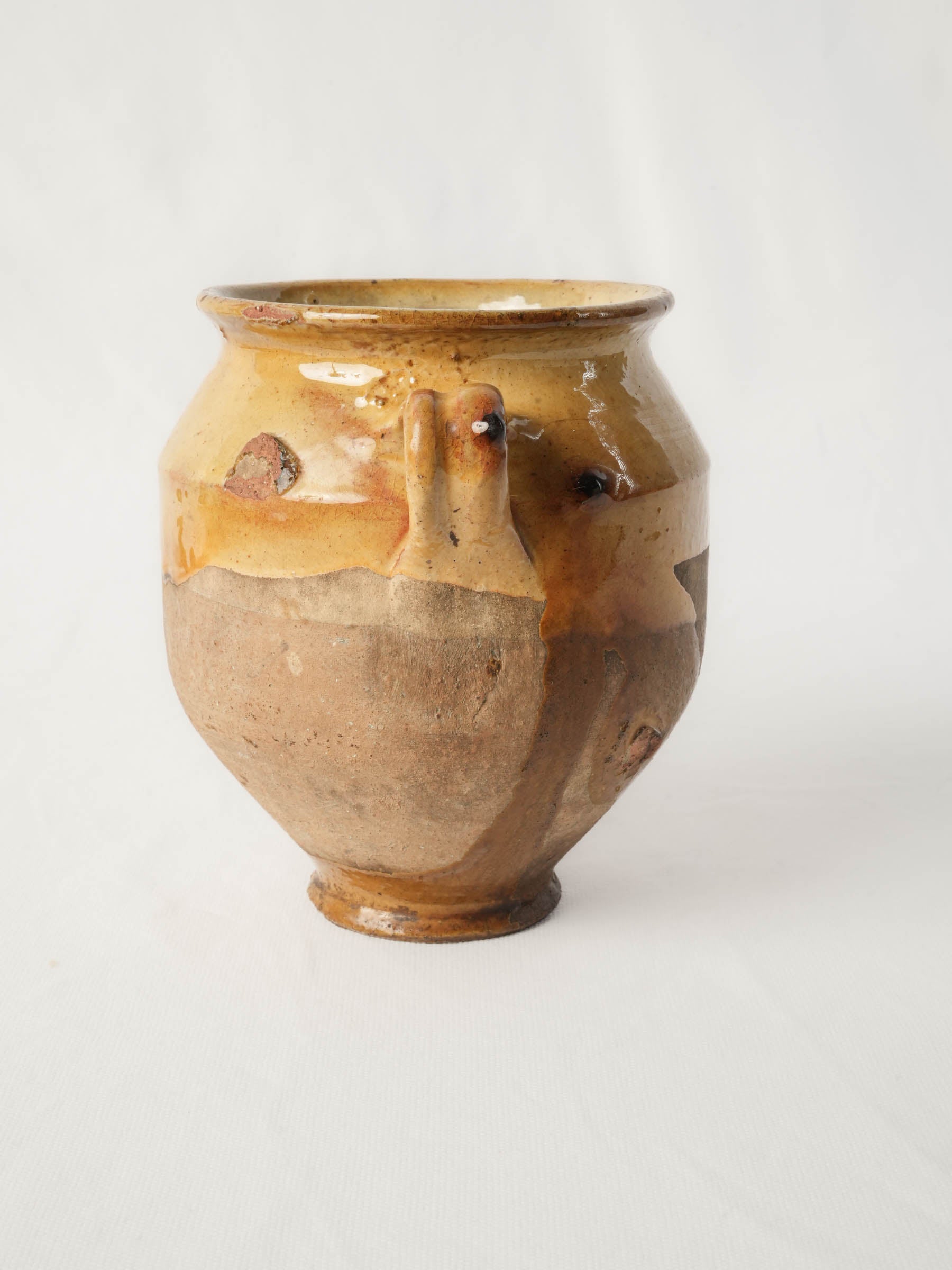 Honey-colored pottery bowl.