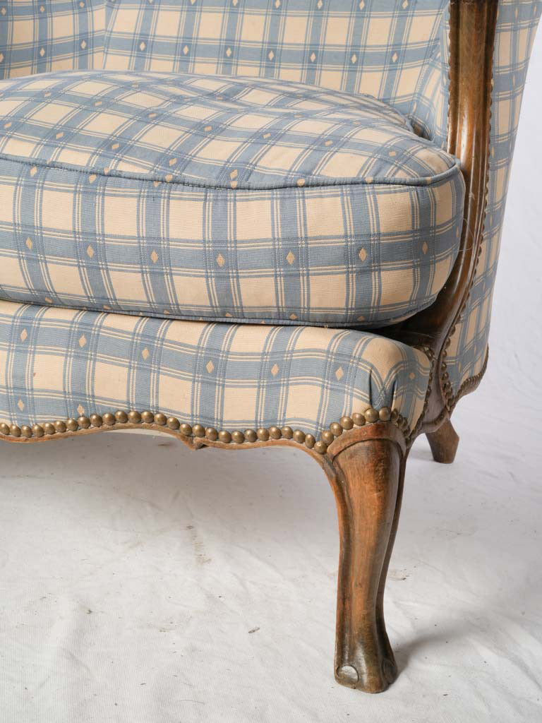 Brass nailhead trim armchairs