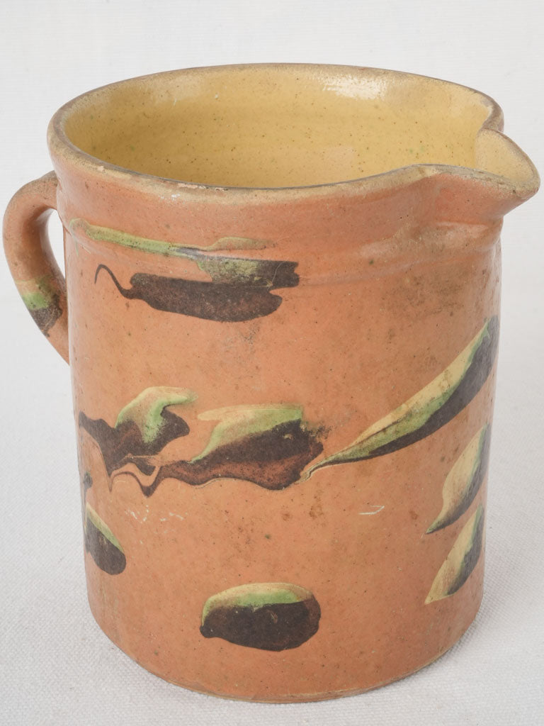 Traditional jaspé-decorated pitcher