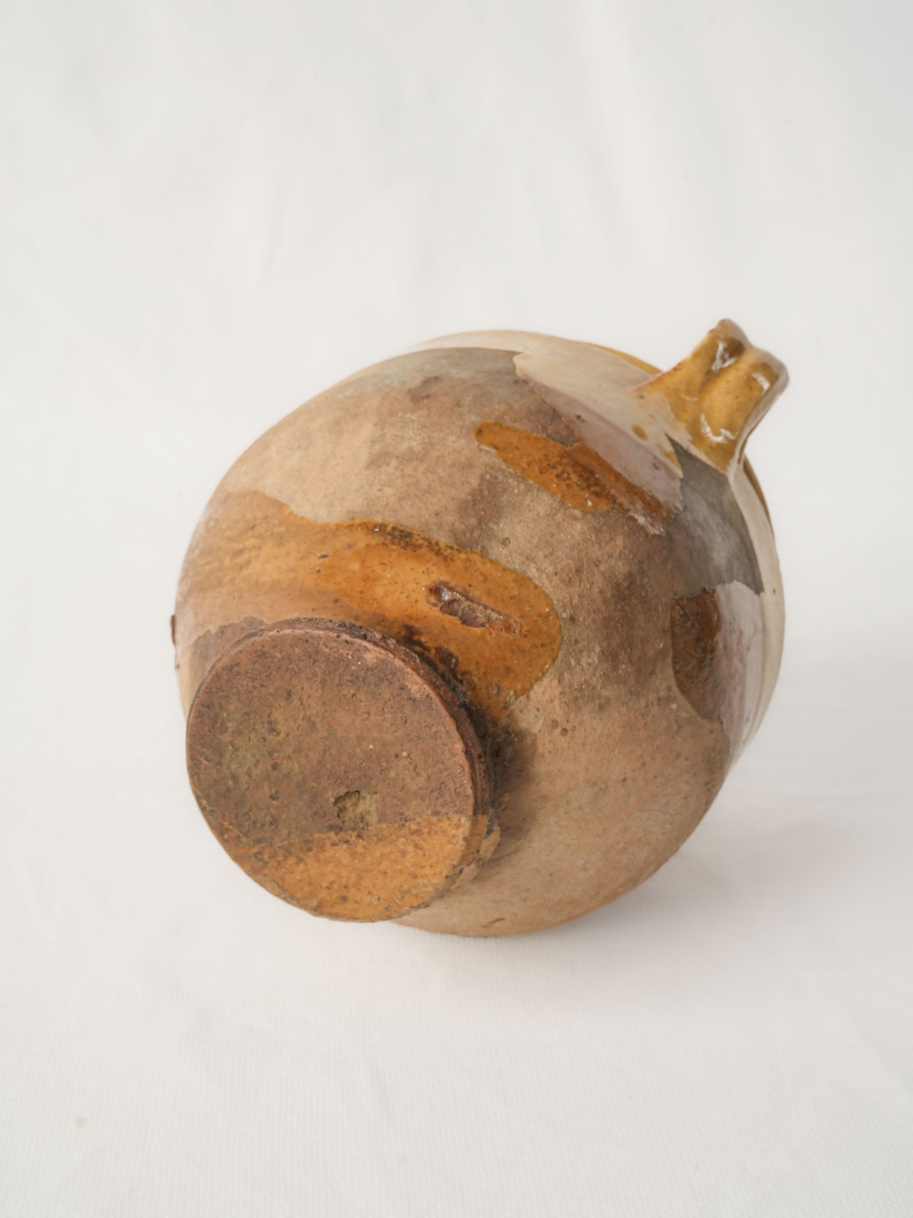 Handcrafted twin-handled vessel.
