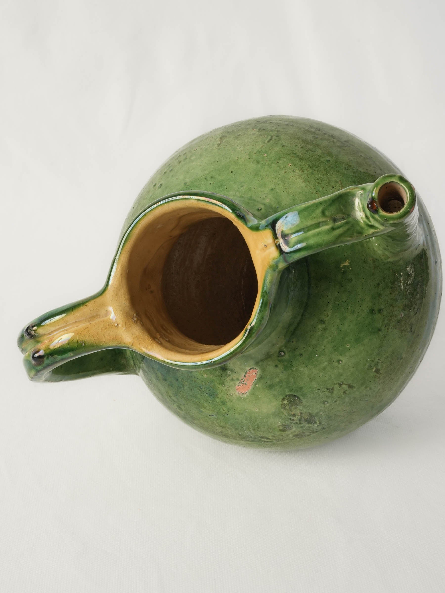 Traditional green ceramic water jug
