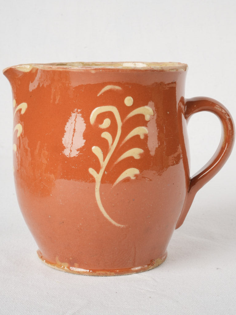 Rustic cream-colored motif vintage pitcher