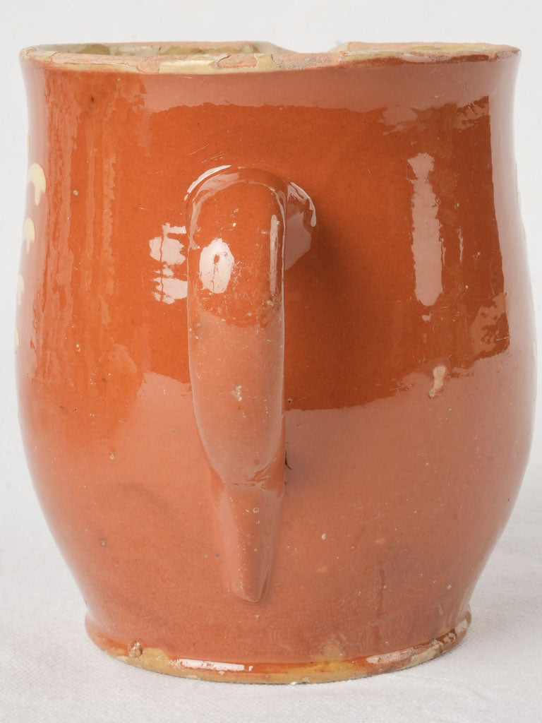 Authentic warm ceramic collector's pitcher