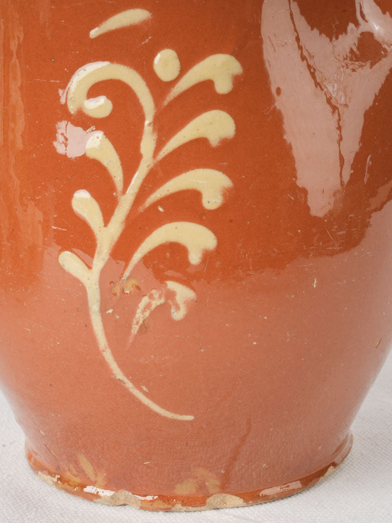 Distinctive yellow-glazed interior pitcher
