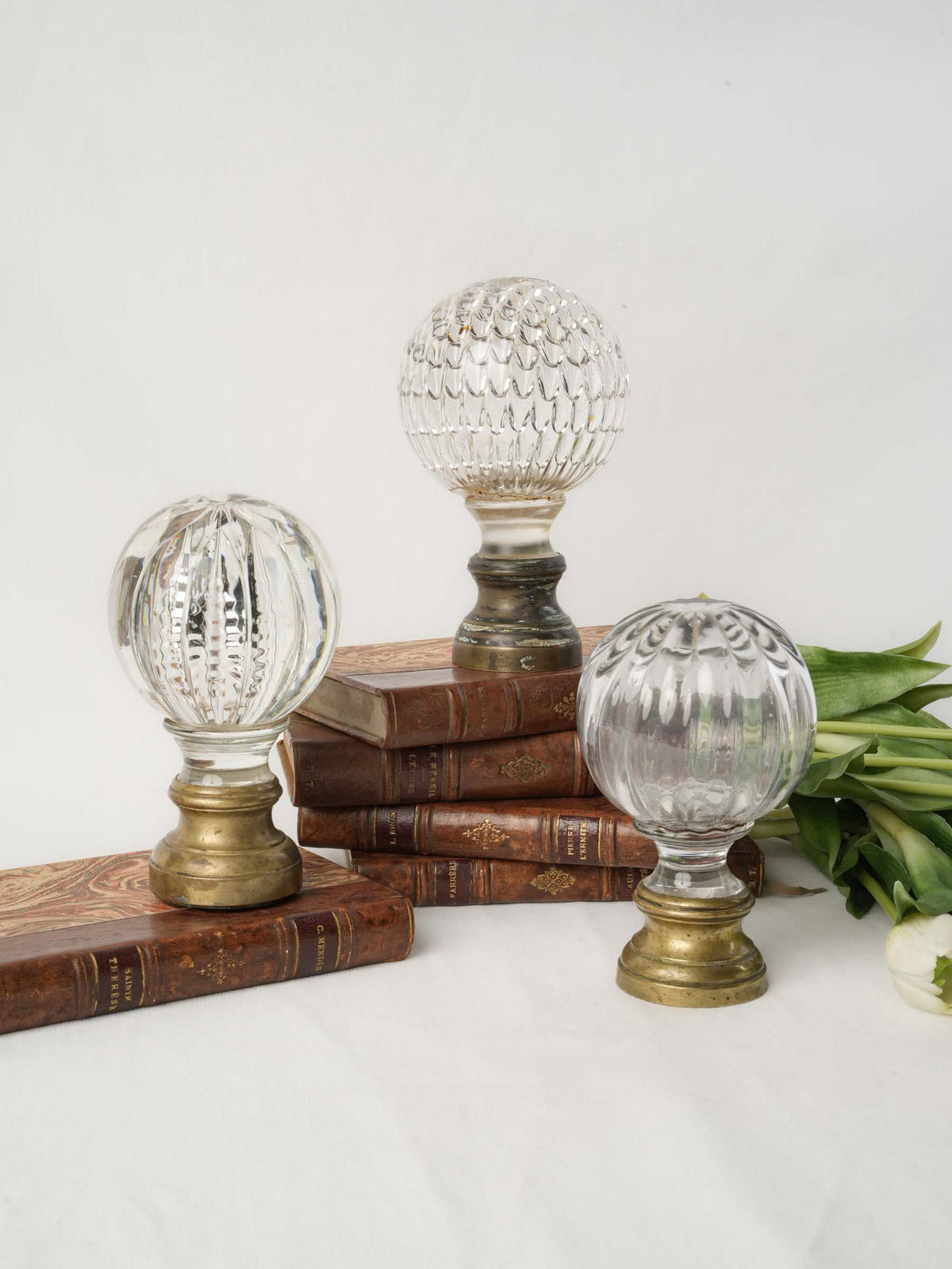 Set of Three Late 19th- to Early 20th-Century Glass and Crystal Staircase Finials on Brass Bases - 6¼"