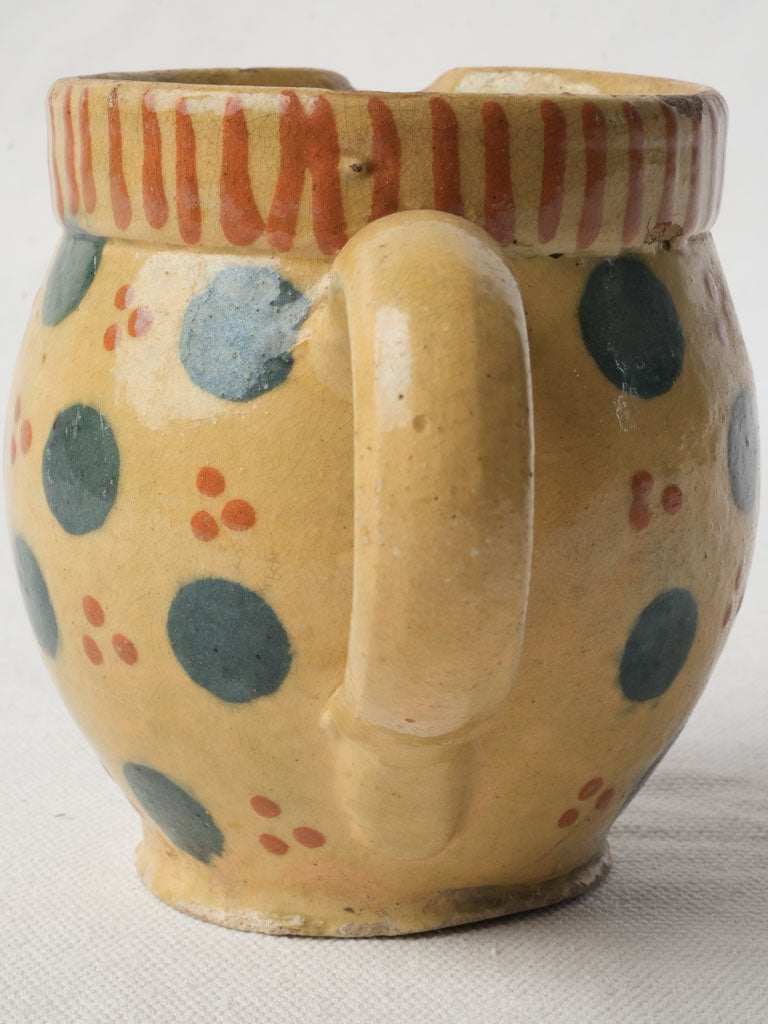Warm straw-glazed milk jug