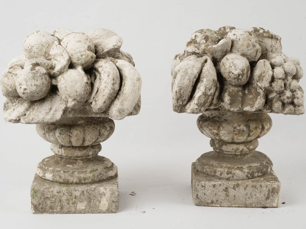 Elegant vintage garden fruit sculptures