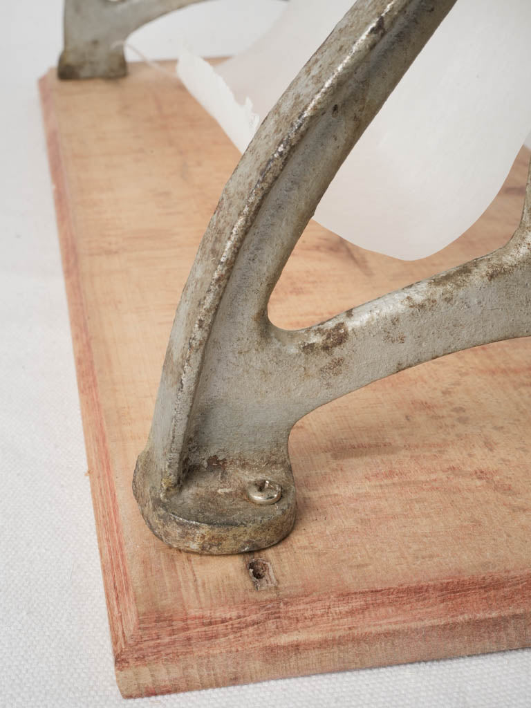 Weathered antique paper dispenser
