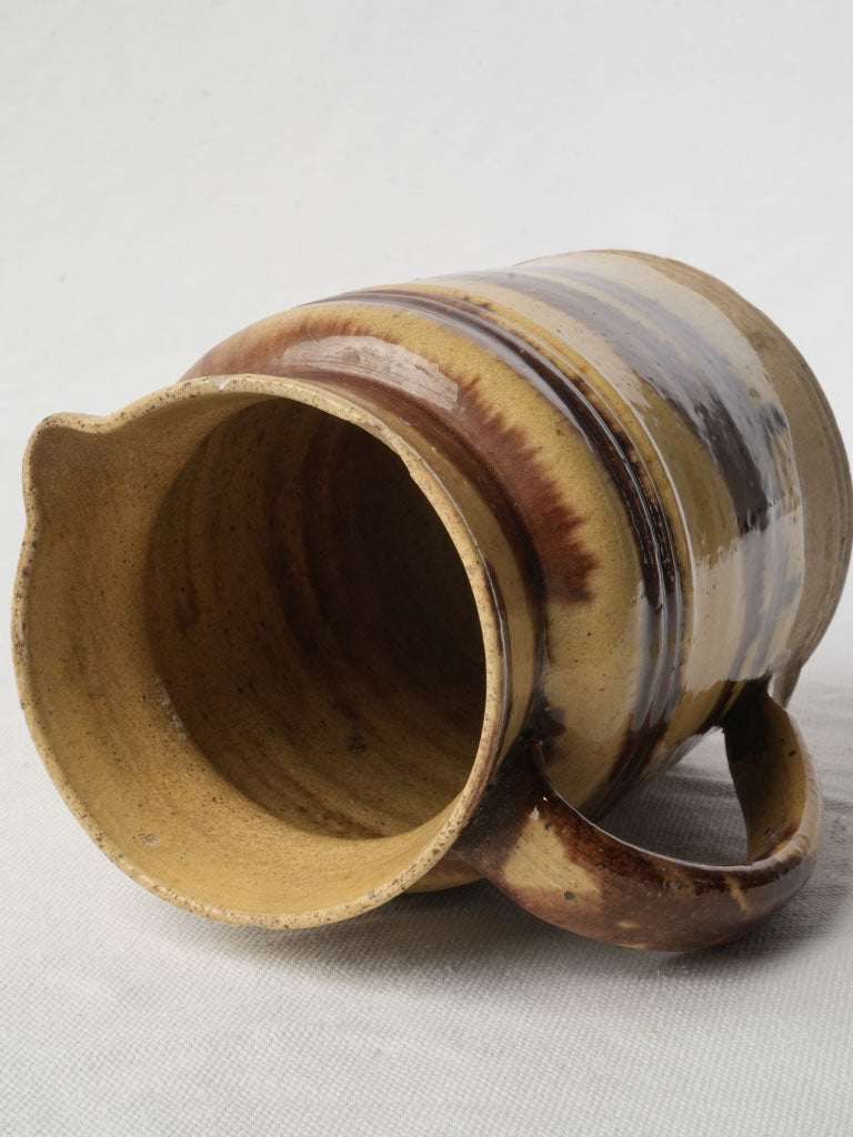 Distinctive pulled-handle earthenware pitcher