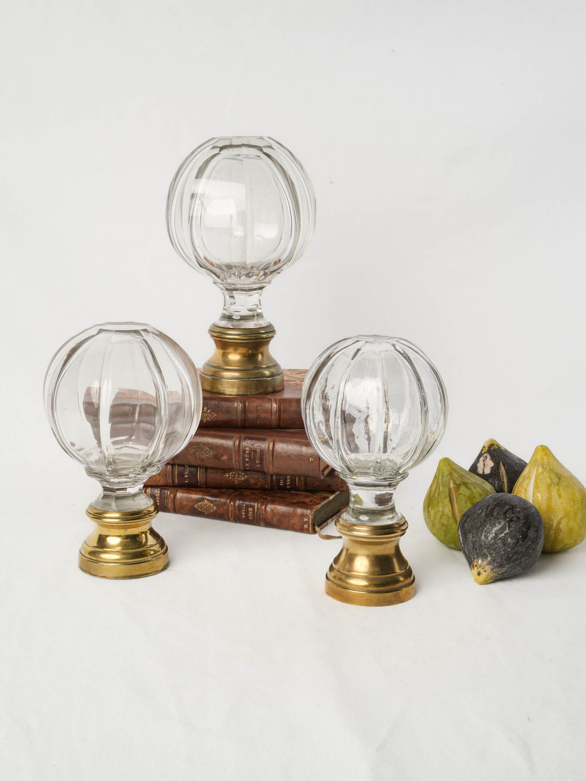 Set of Three Early 20th-Century Glass Staircase Finials on Polished Brass Bases - 6¾"