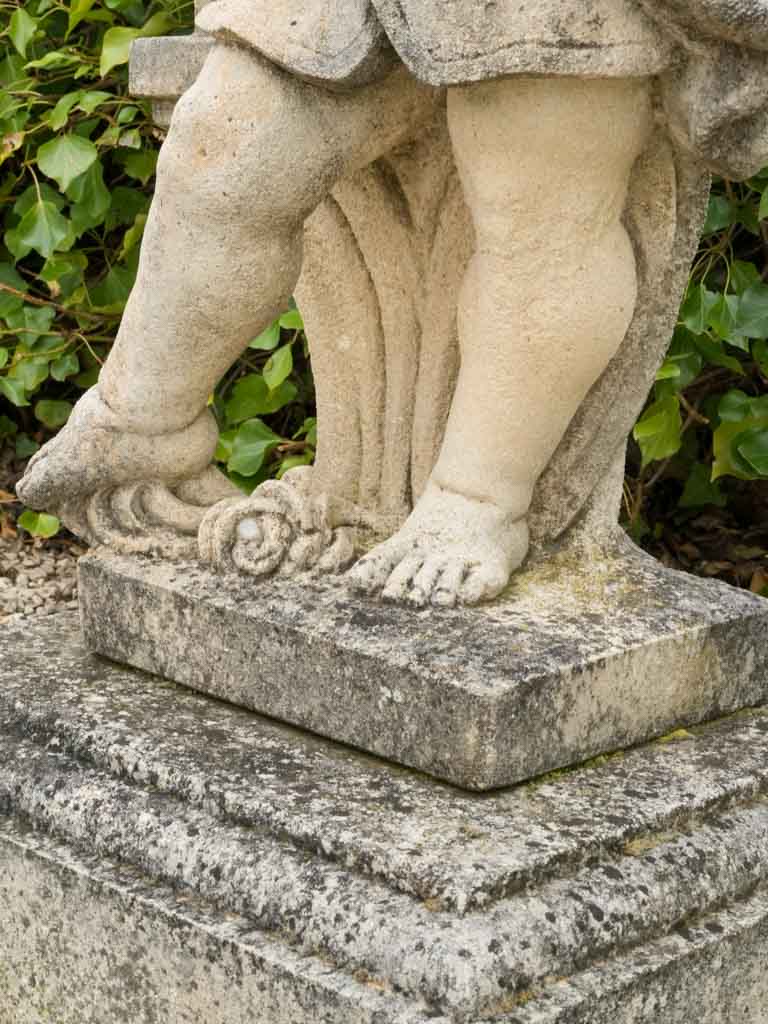Classical Provencal-style cherub statue